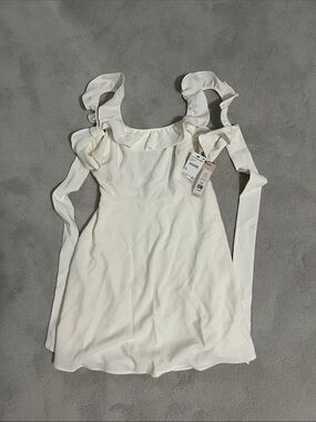 BCBGeneration Cream Ruffle Strap Mini Dress